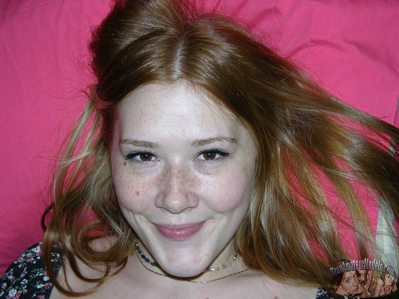 Young redhead Harper grabs her butt  